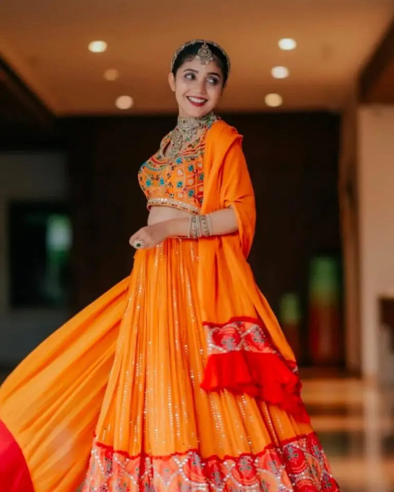 Model wearing western dress in designer boutique calicut