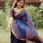 Model wearing dark blue mangalgiri saree in designer boutique calicut