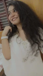 A girl wearing salwar in designer boutique in calicut